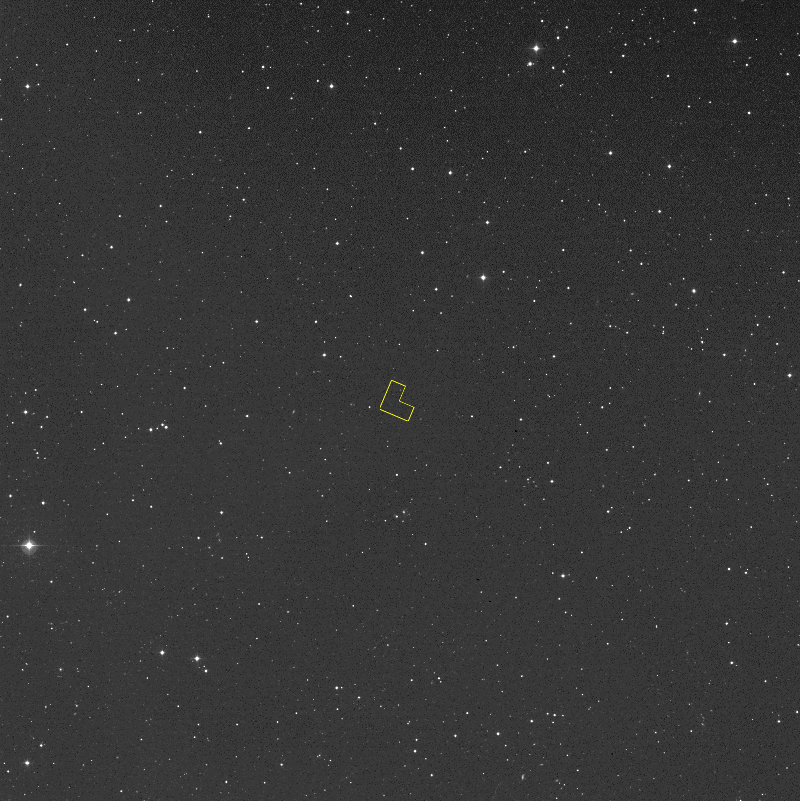 A star field with a small keyhole-shaped outline marking the Hubble deep field region