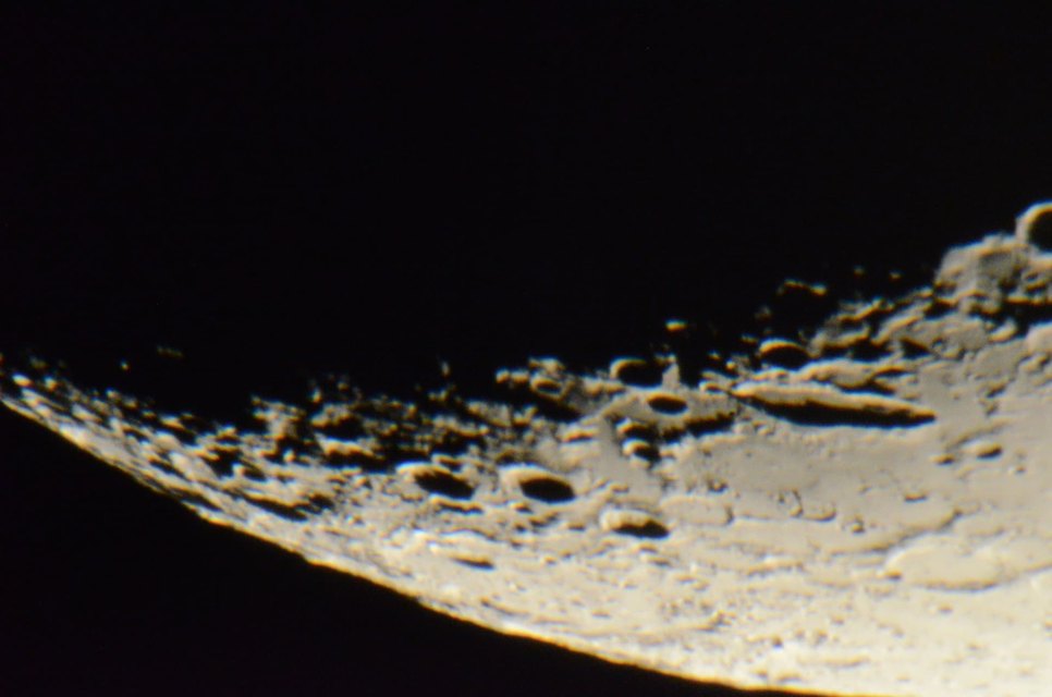 Craters and mountains along the Moon's terminator